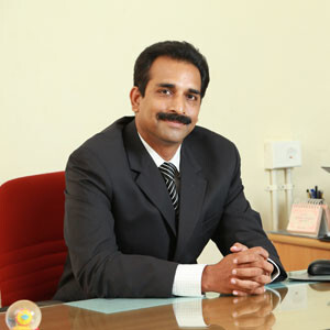 Dr. P A Mathew